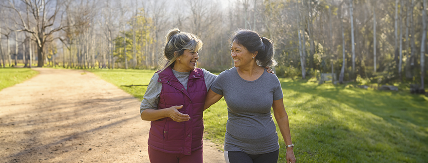 Women outside walking on a path